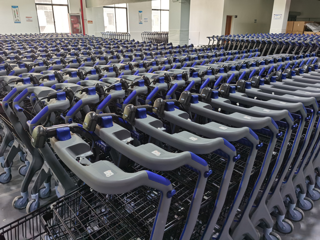 Smart shopping carts stack together closely to save space